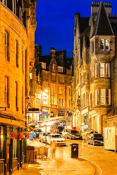 The Royal Mile illuminated at dusk